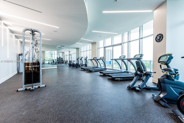 488 NE 18th St Unit 208, Miami, FL 33132 - exercise room featuring baseboards