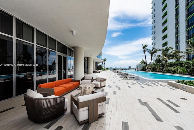 488 NE 18th St Unit 208, Miami, FL 33132 - community pool featuring an outdoor living space