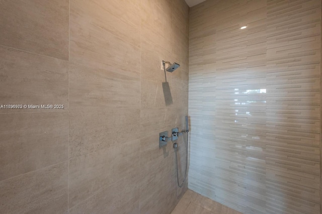 488 NE 18th St Unit 208, Miami, FL 33132 - bathroom featuring tiled shower