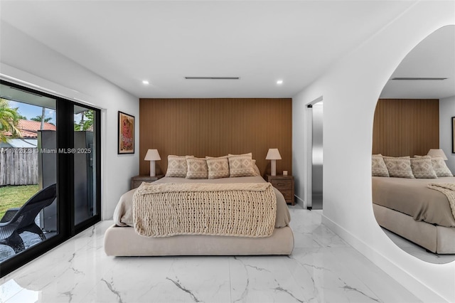 13211 SW 6th St, Miami, FL 33184 - bedroom featuring recessed lighting, baseboards, wood walls, an accent wall, and access to exterior