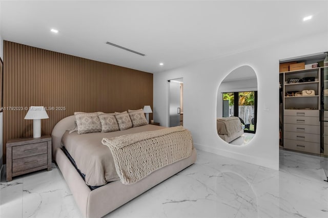 13211 SW 6th St, Miami, FL 33184 - bedroom with an accent wall, baseboards, marble finish floor, and recessed lighting