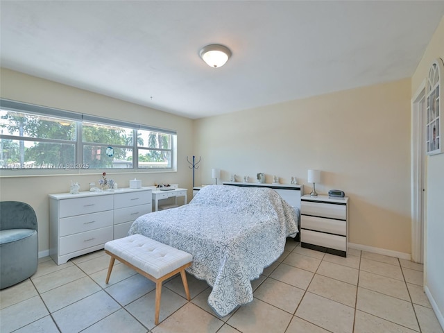 104 N 31st Ct, Hollywood, FL 33021 - bedroom with baseboards and light tile patterned flooring
