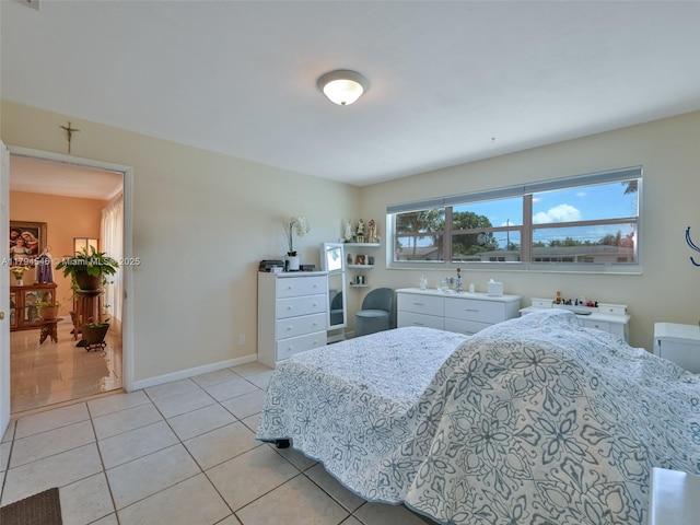 104 N 31st Ct, Hollywood, FL 33021 - bedroom with baseboards and light tile patterned floors