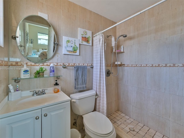 104 N 31st Ct, Hollywood, FL 33021 - bathroom featuring vanity, toilet, tile walls, and a tile shower