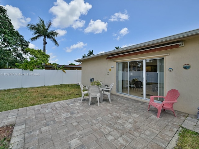 104 N 31st Ct, Hollywood, FL 33021 - view of patio featuring fence and outdoor dining space