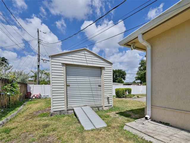 104 N 31st Ct, Hollywood, FL 33021 - garage with fence and a storage unit