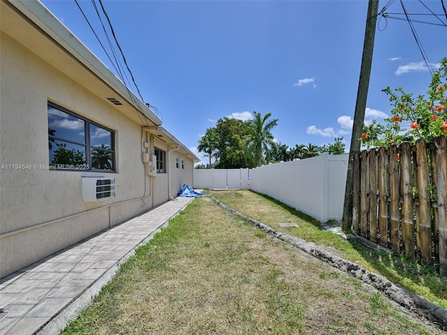 104 N 31st Ct, Hollywood, FL 33021 - view of yard with ac unit and a fenced backyard