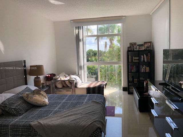 bedroom featuring a textured ceiling
