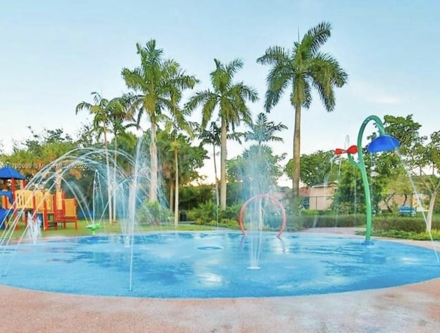 view of property's community with playground community