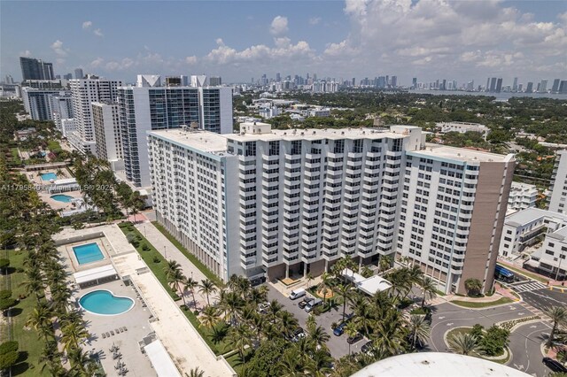 2899 Collins Ave Unit 1738, Miami Beach, FL 33140 - drone / aerial view of a pool and city skyline