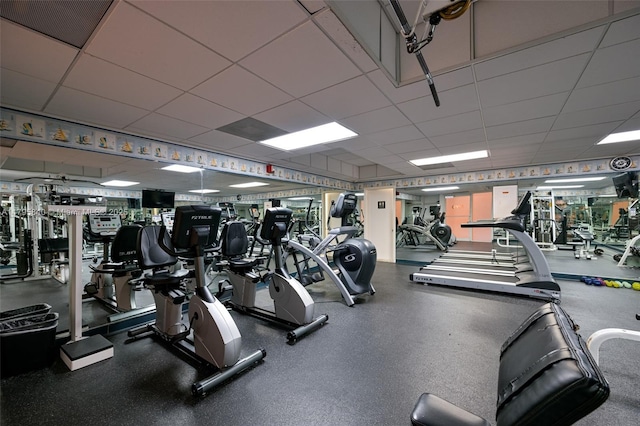 2899 Collins Ave Unit 1738, Miami Beach, FL 33140 - gym featuring a paneled ceiling