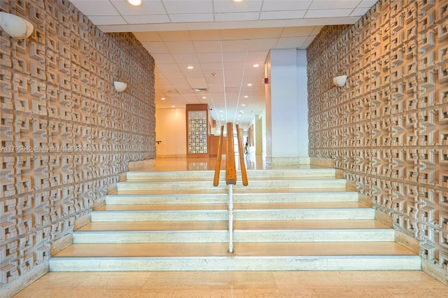 2899 Collins Ave Unit 1738, Miami Beach, FL 33140 - staircase with recessed lighting and a drop ceiling