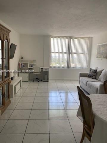2899 Collins Ave Unit 1738, Miami Beach, FL 33140 - living room featuring healthy amount of natural light