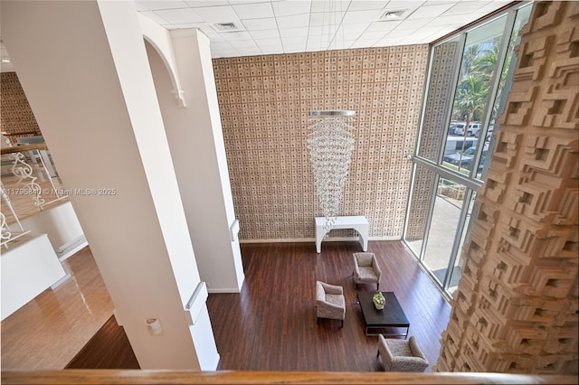 2899 Collins Ave Unit 1738, Miami Beach, FL 33140 - unfurnished dining area with wood finished floors, baseboards, and expansive windows