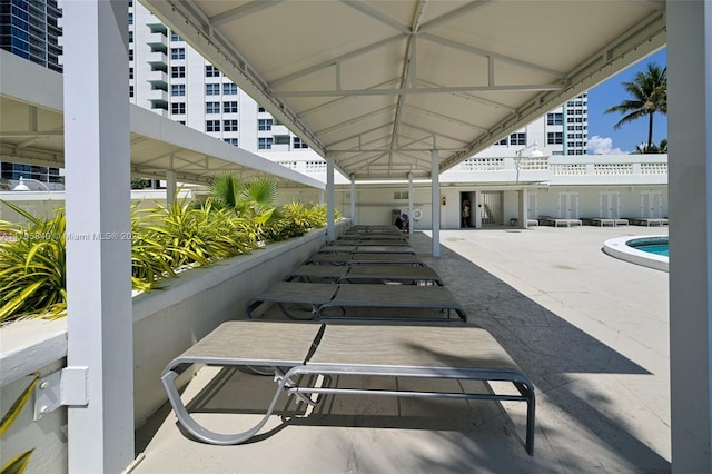 2899 Collins Ave Unit 1738, Miami Beach, FL 33140 - view of patio / terrace featuring a community pool