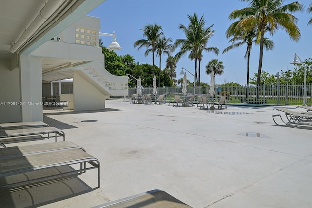 2899 Collins Ave Unit 1738, Miami Beach, FL 33140 - view of swimming pool with stairs and a patio area