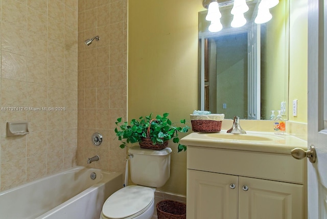 full bath with toilet, vanity, and shower / bathing tub combination