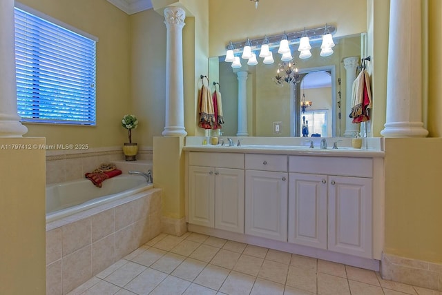 bathroom featuring a sink, tile patterned flooring, and ornate columns