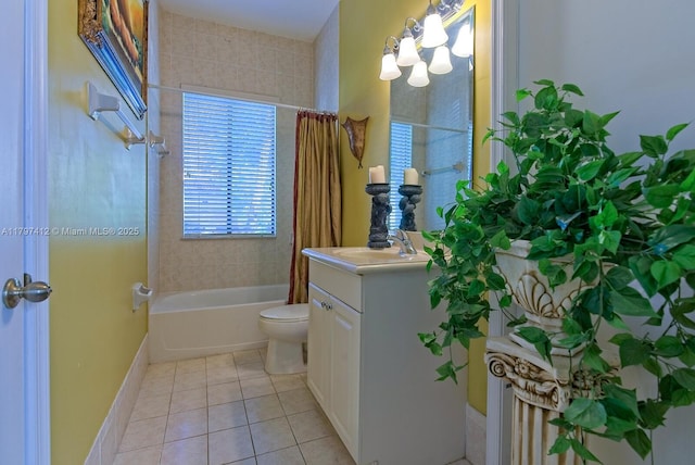 bathroom featuring toilet, tile patterned flooring, vanity, and shower / bathtub combination with curtain