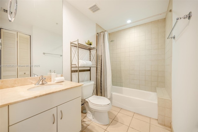full bathroom featuring toilet, visible vents, shower / bath combination with curtain, tile patterned floors, and vanity