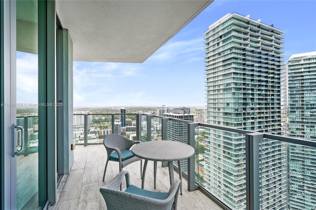 balcony featuring a city view