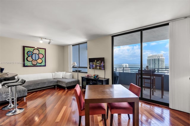 1330 W Ave Unit 3003, Miami Beach, FL 33139 - dining area featuring hardwood / wood-style flooring