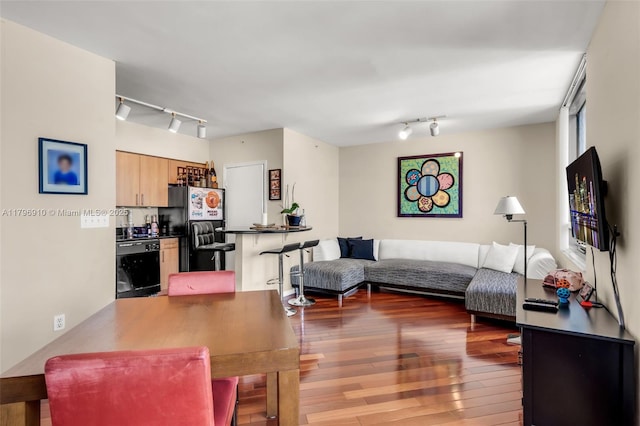 1330 W Ave Unit 3003, Miami Beach, FL 33139 - living area featuring rail lighting and hardwood / wood-style floors