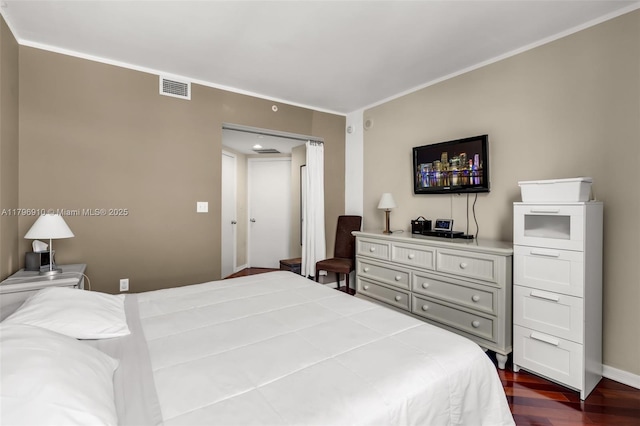 1330 W Ave Unit 3003, Miami Beach, FL 33139 - bedroom featuring visible vents, dark wood-style flooring, baseboards, and ornamental molding
