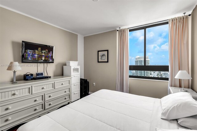 1330 W Ave Unit 3003, Miami Beach, FL 33139 - bedroom featuring crown molding