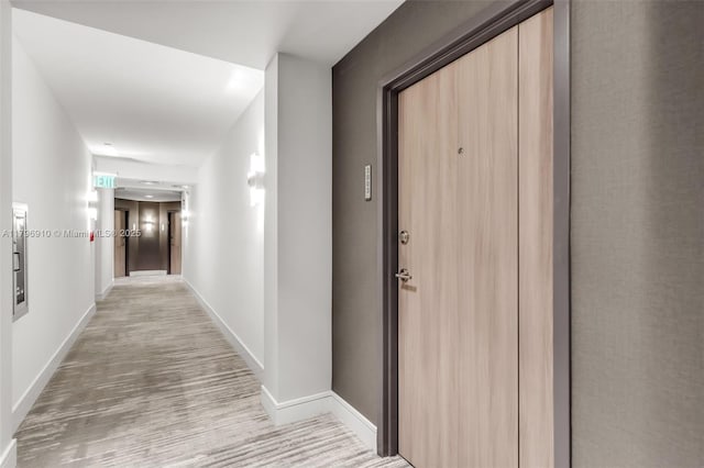 1330 W Ave Unit 3003, Miami Beach, FL 33139 - hall with baseboards and light wood finished floors