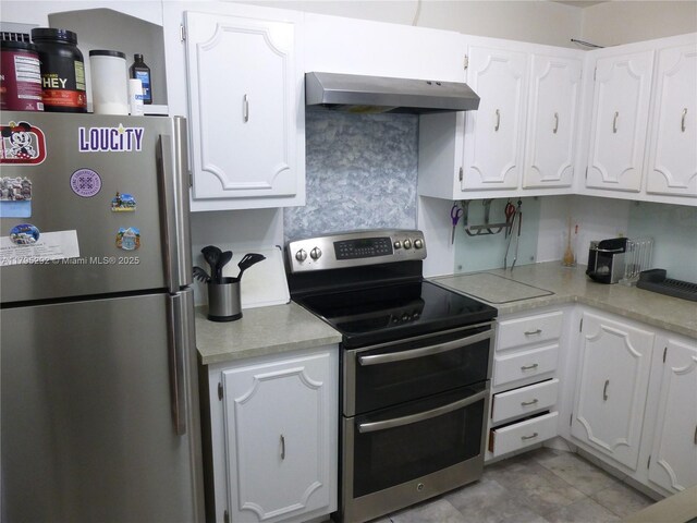 2801 NE 183rd St Unit 1507W, Aventura, FL 33160 - kitchen with white cabinetry, light countertops, appliances with stainless steel finishes, and under cabinet range hood
