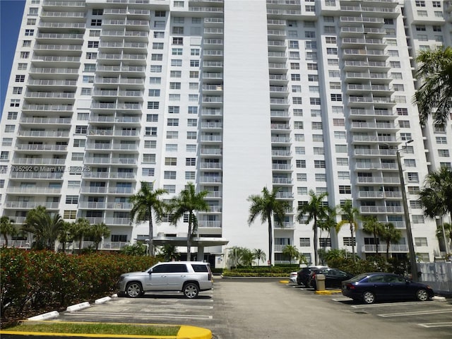 2801 NE 183rd St Unit 1507W, Aventura, FL 33160 - view of building exterior featuring uncovered parking