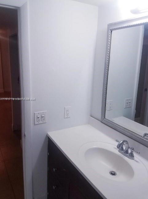 bathroom with vanity and tile patterned floors