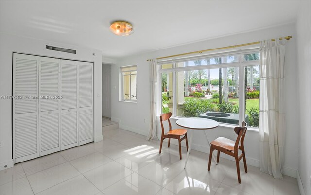 18445 NE 27th Pl, Aventura, FL 33160 - dining space with a wealth of natural light, baseboards, and visible vents
