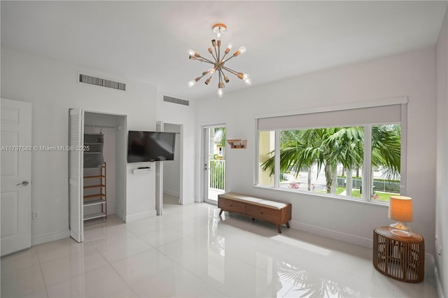 18445 NE 27th Pl, Aventura, FL 33160 - living room featuring baseboards, an inviting chandelier, and visible vents