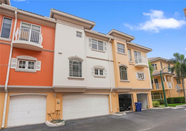 18445 NE 27th Pl, Aventura, FL 33160 - view of property with an attached garage