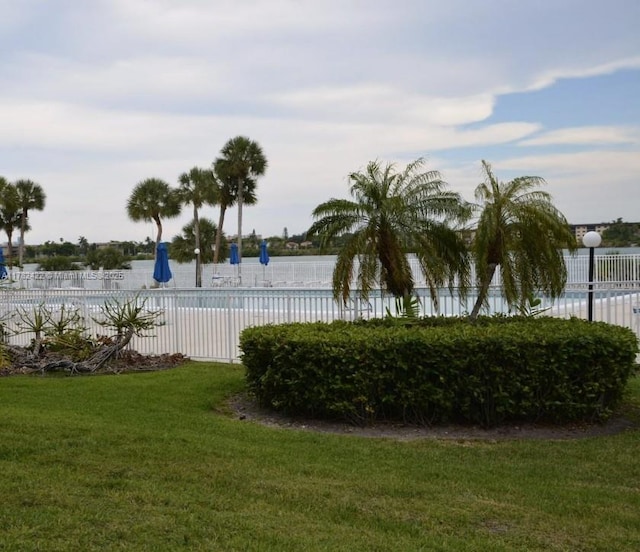 20850 San Simeon Way Unit 408-5, Miami, FL 33179 - view of yard with fence and a community pool