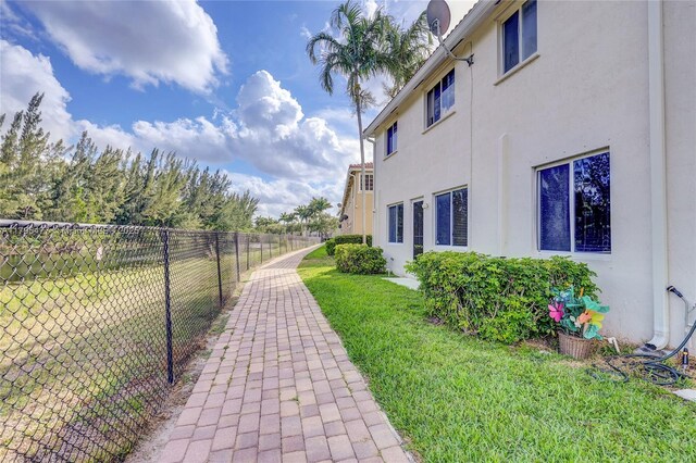 21133 NW 14th Pl, Miami Gardens, FL 33169 - surrounding community featuring a yard and fence