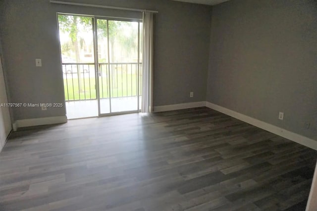 1722 W Meadows Cir W Unit 1722, Boynton Beach, FL 33436 - spare room featuring wood finished floors and baseboards