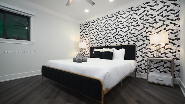 bedroom featuring ornamental molding, recessed lighting, an accent wall, dark wood-style flooring, and baseboards