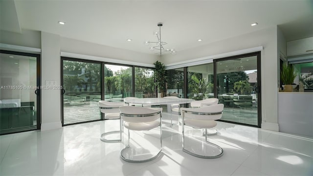 tiled dining area featuring recessed lighting