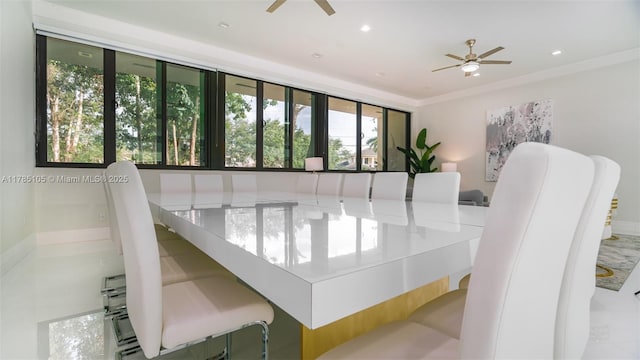 dining space with ceiling fan, crown molding, and recessed lighting