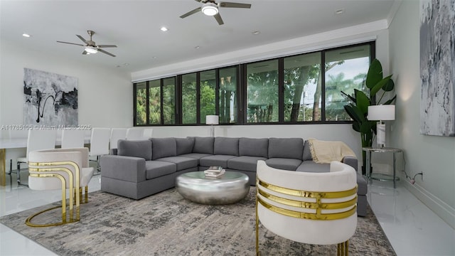 living room featuring a wealth of natural light, a ceiling fan, and recessed lighting