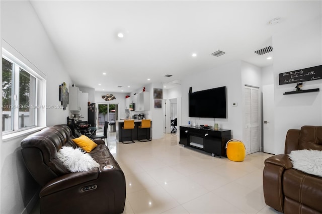 1793 NW 93rd Ter, Miami, FL 33147 - living room with recessed lighting, visible vents, and light tile patterned flooring