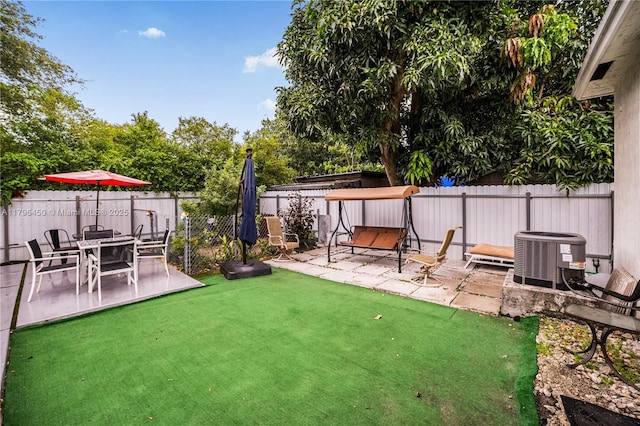 1793 NW 93rd Ter, Miami, FL 33147 - view of yard featuring cooling unit, a patio, and a fenced backyard