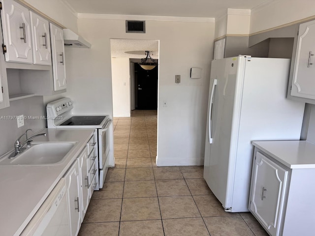 kitchen featuring a sink, visible vents, white appliances, under cabinet range hood, and light tile patterned flooring
