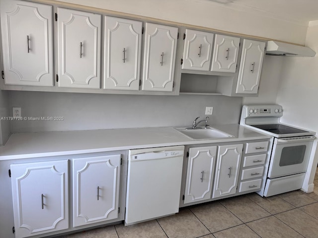 kitchen featuring a sink, white appliances, light tile patterned flooring, under cabinet range hood, and light countertops