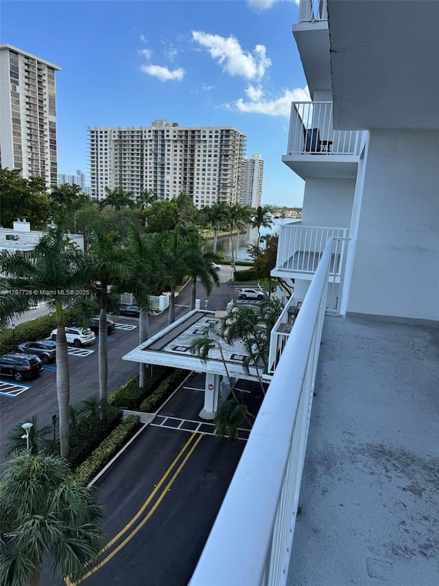 balcony with a city view and a water view