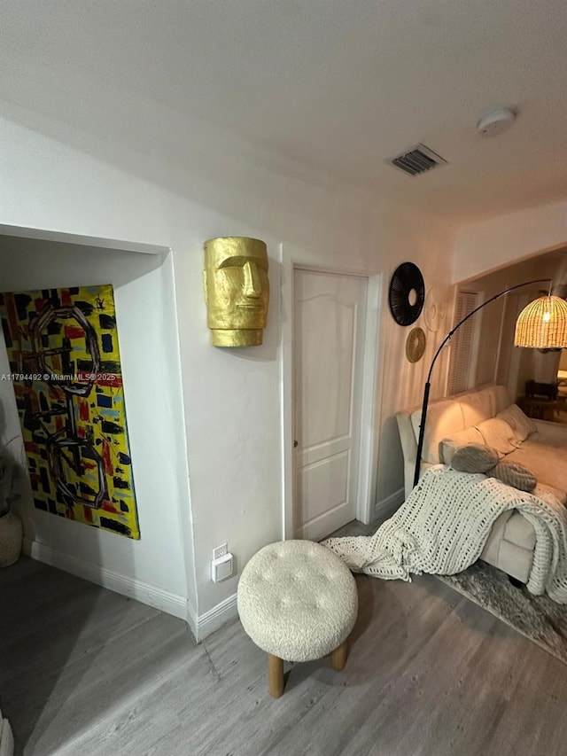1874 NW 65th St, Miami, FL 33147 - bedroom with baseboards, visible vents, and wood finished floors
