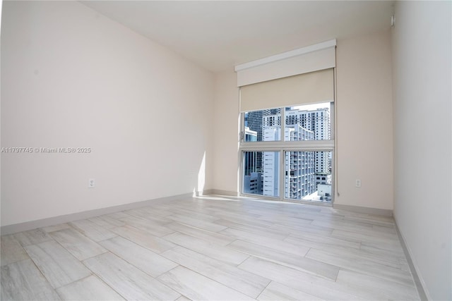 1010 SW 2nd Ave Unit 1703, Miami, FL 33130 - empty room with baseboards